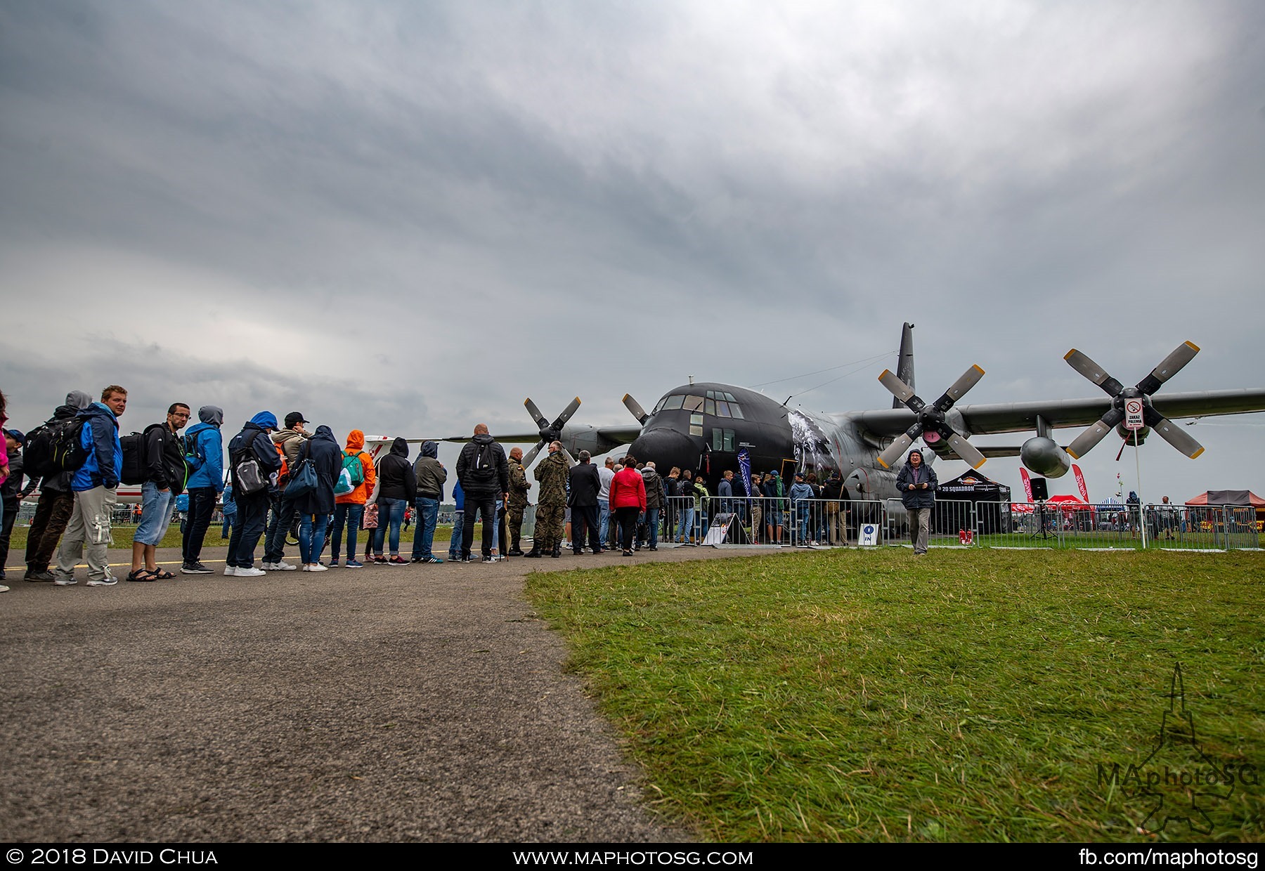 11. Long line of the queue for a closer look inside the Belgium Air Force C-130H Hercules with special livery