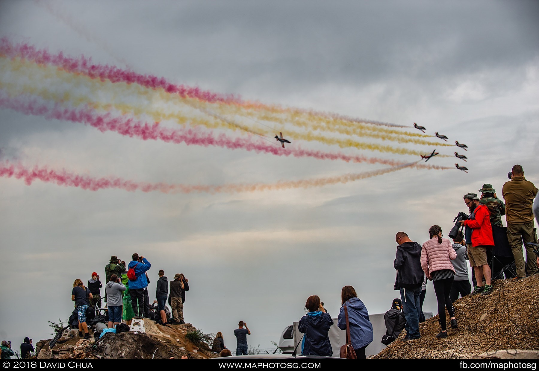 36. Crowd on the opposite side of the runway catches the Spanish Air Force Patrulla Águila performance