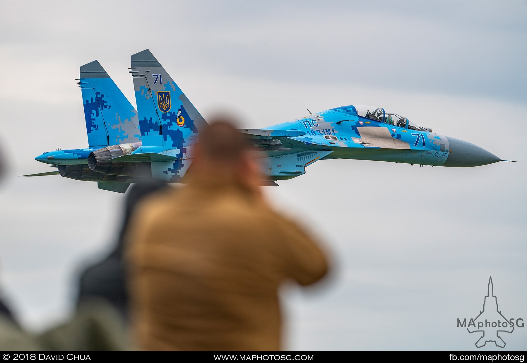 44. Photographers tries to capture the Ukrainian Air Force Su-27 Flaker as it performed a low pass