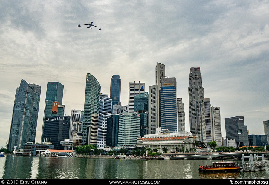 A330-MRTT with 2 F-15SG escorts fly past the Central Business District