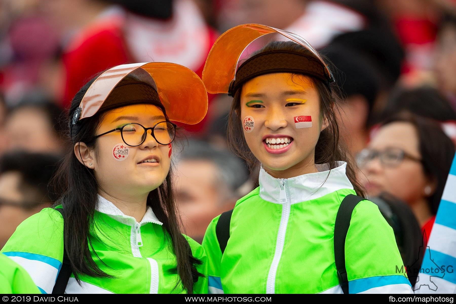 Cheerleaders singing along with the many national songs 