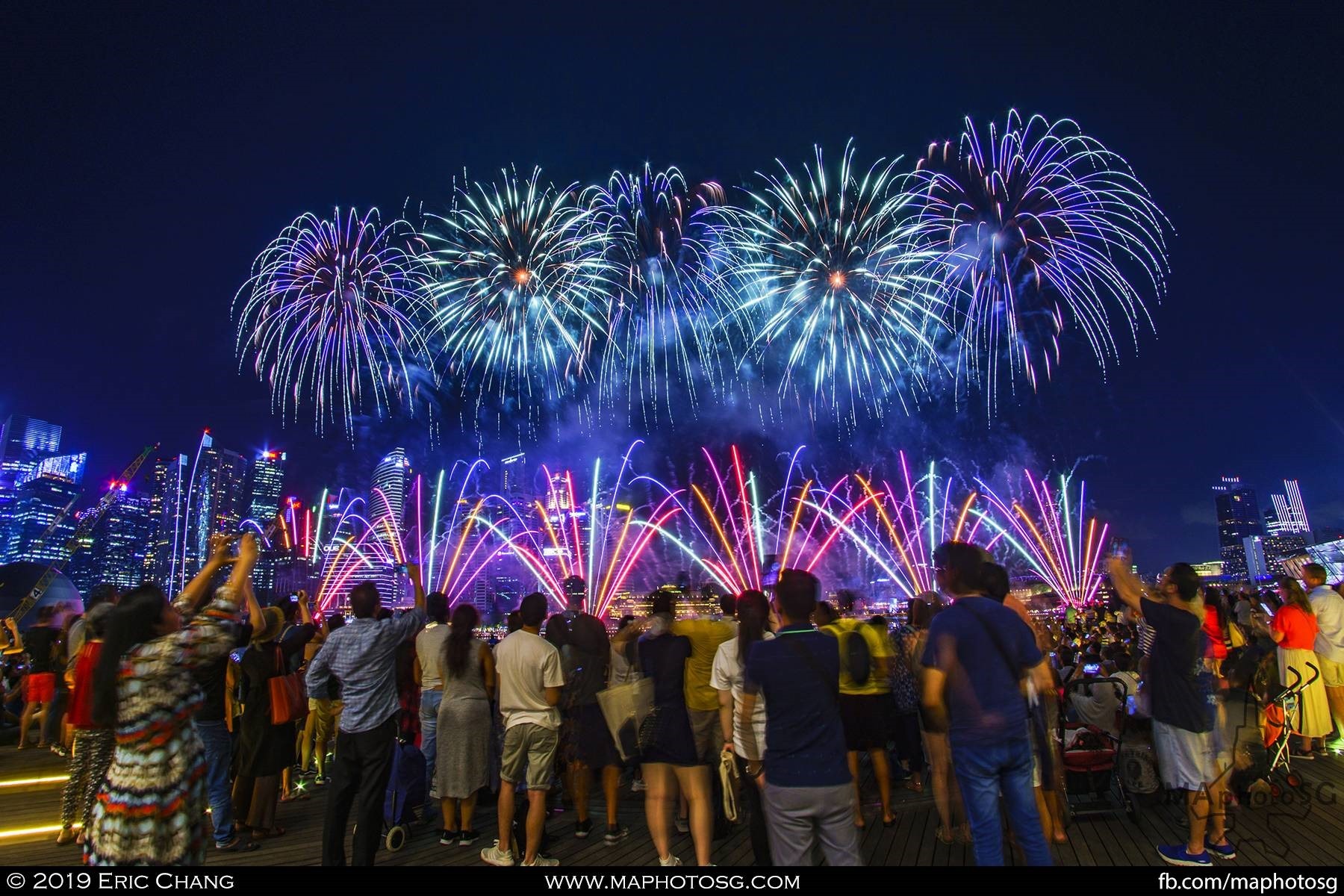 Crowd at he Marina Bay Waterfront area enjoying the fireworks