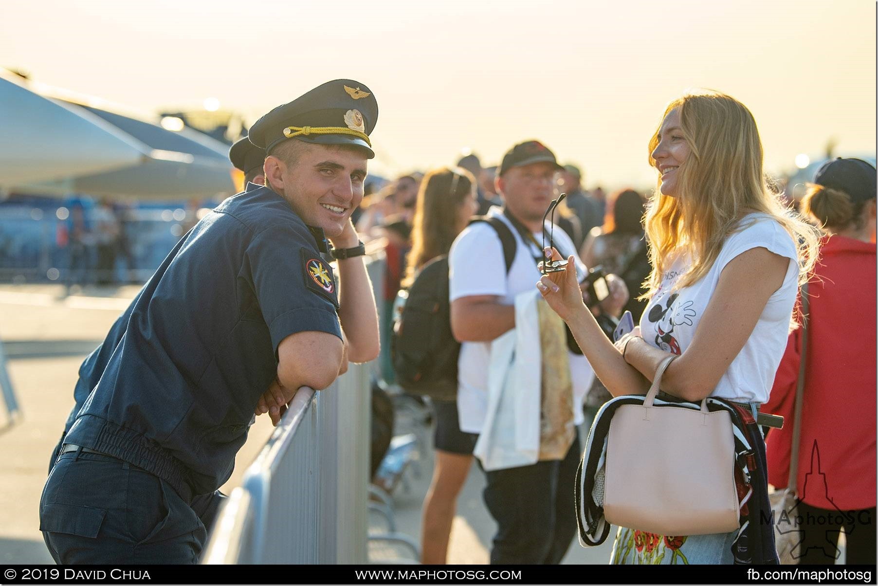 One of the many visitors chatting with the fighter pilots