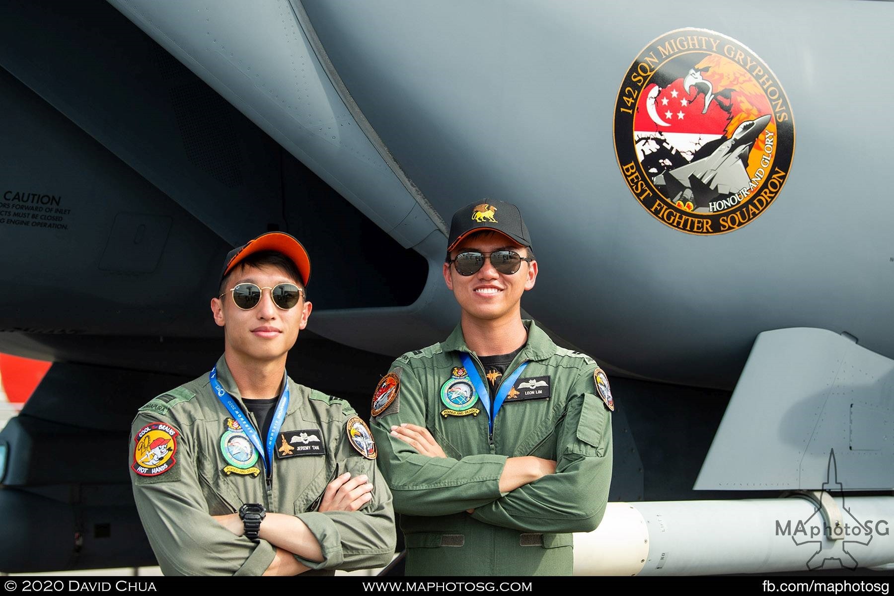 Aircrew of the RSAF 142 Squadron with their F-15SG fighter aircraft showing off the best fighter squadron badge