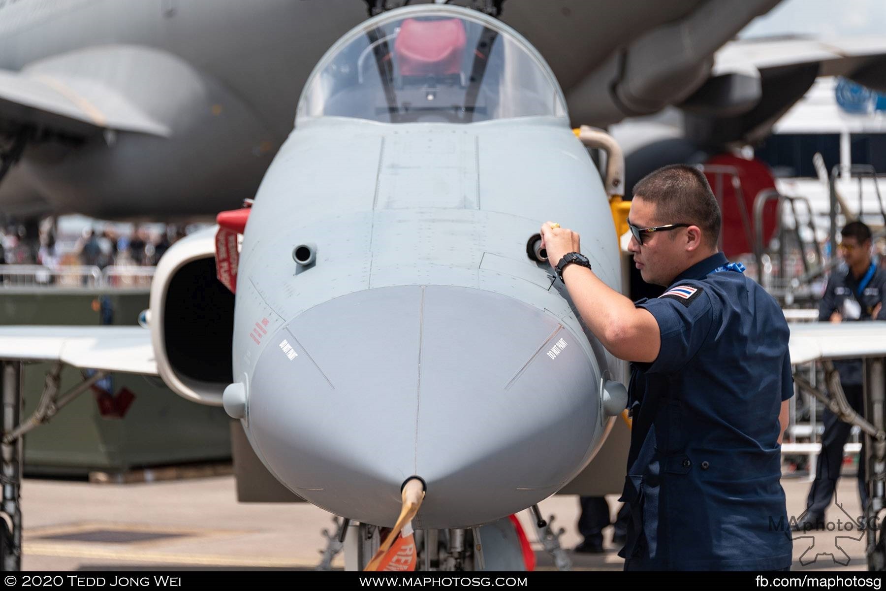 RTAF crew taking a close look at the 20mm gun of the F-5TH.