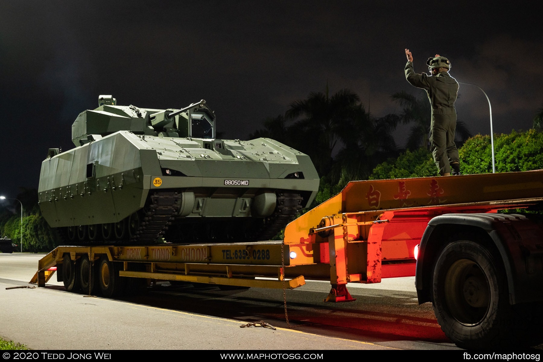The Singapore Army's Hunter Armoured Fighting Vehicle is loaded onto a flatbed at the end of a Mobile Column rehearsal in Tuas.