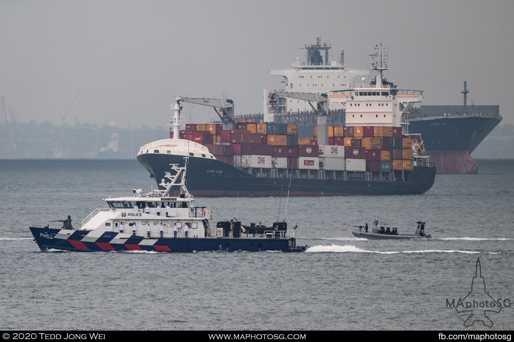 The Police Coast Guard PH-class Coastal Patrol Craft, White Shark, and PT-class Patrol Interdiction Boat, sail past during the Maritime Sailpast rehearsal.