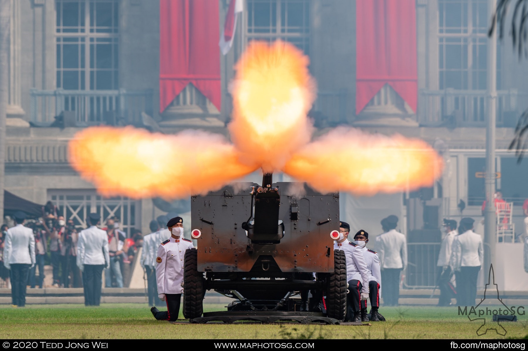 Frontal shot of a 25-pounder Ceremonial Gun firing during the Presidential 21-Gun Salute.