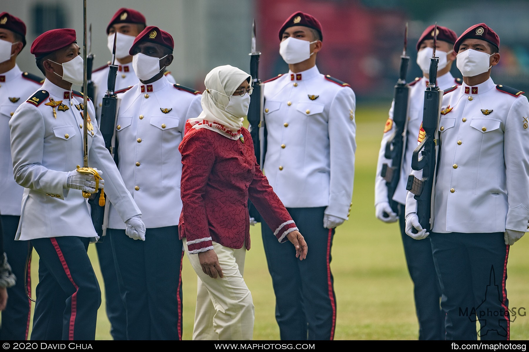 Madam President Halimah Yacob inspects the Guard of Honor President contingents.