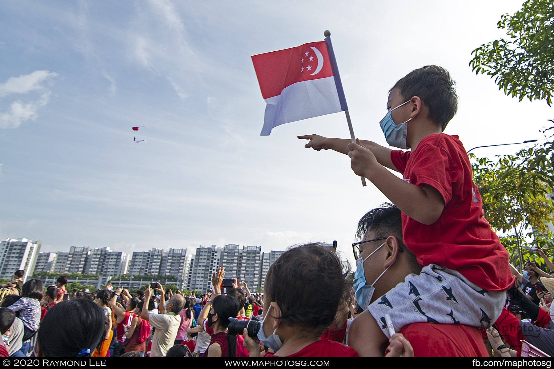 Spectators watch as the Red Lions descent into the heartlands in Sengkang.