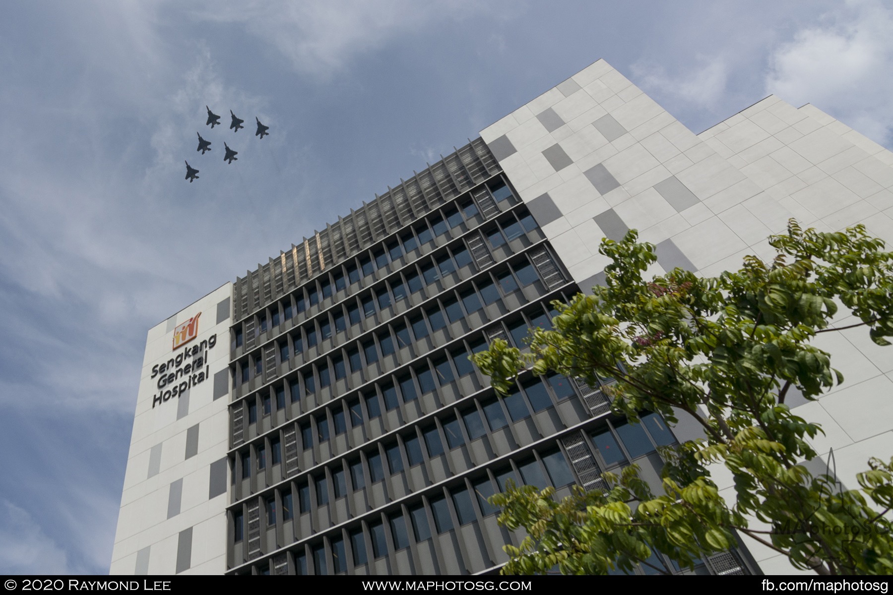 The Roar of Unity flight overflies Sengkang General Hospital.
