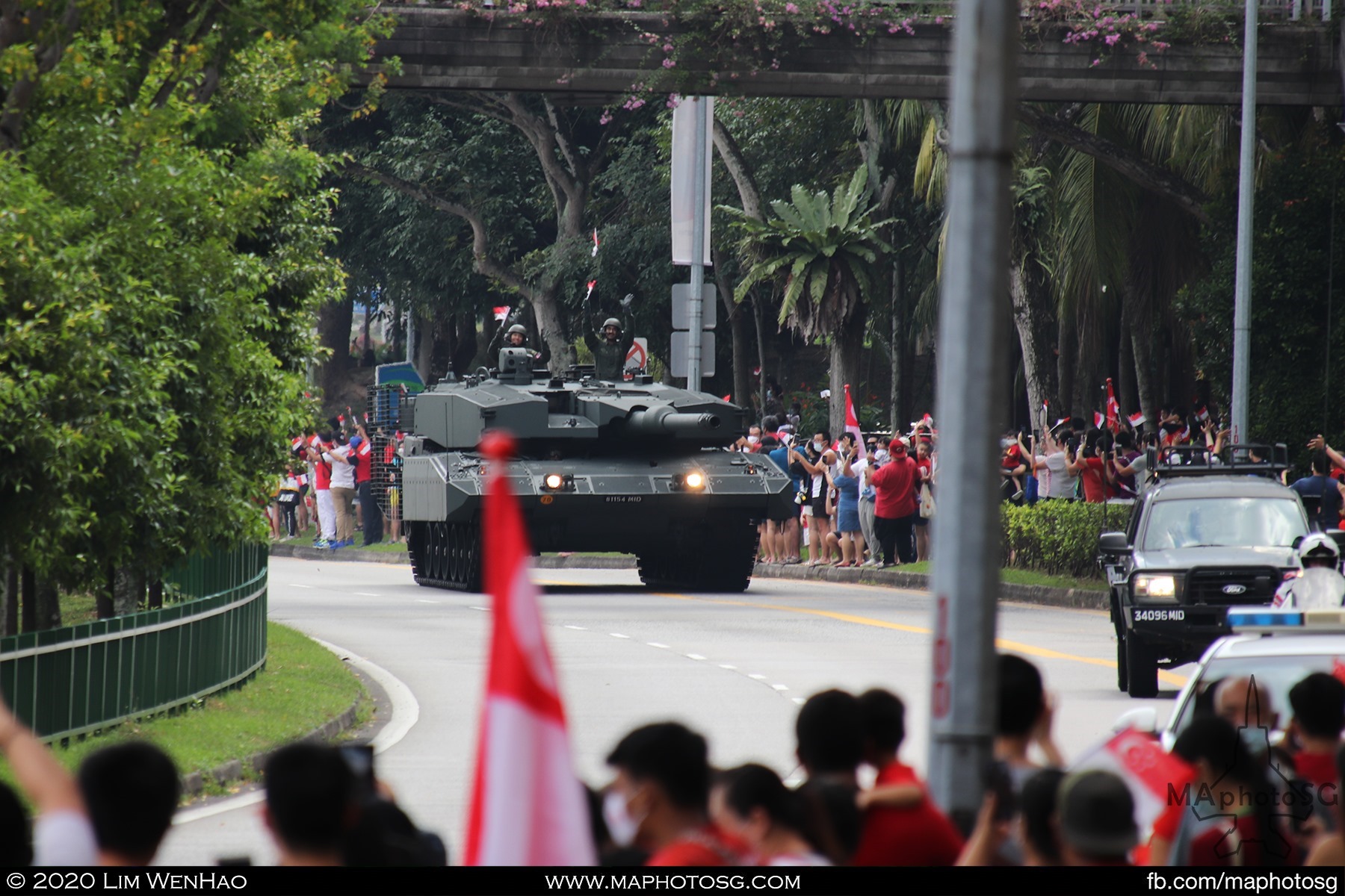 Crowds cheer as the Leopard 2SG rolls through the heartlands as part of the Mobile Column.