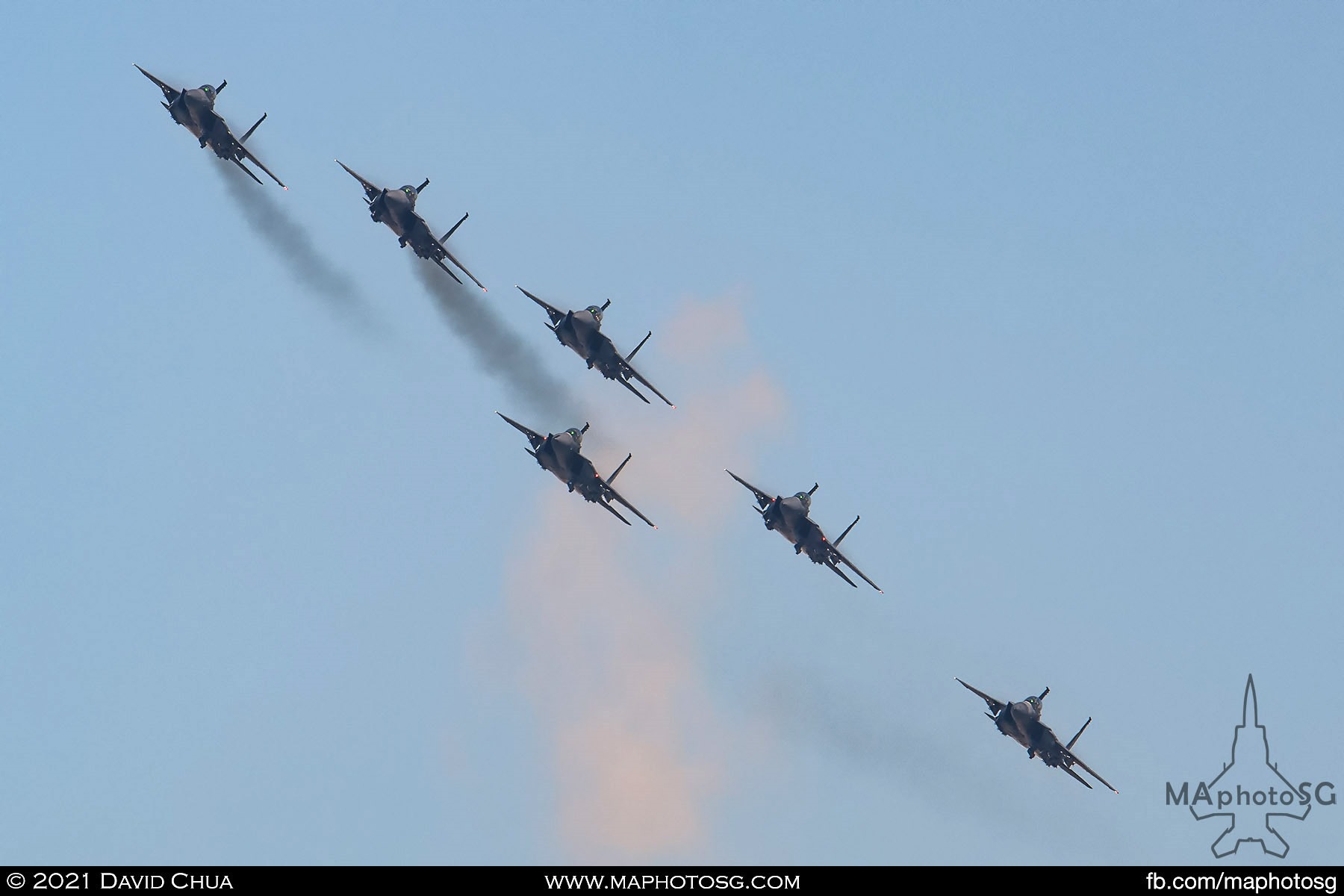 RSAF F-15SG flying in delta formation circling Singapore