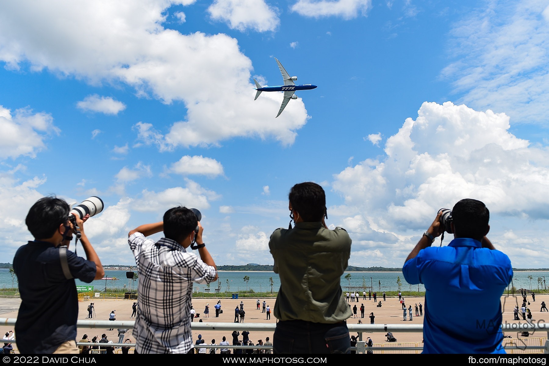 Safe distancing measures observed while photographers click away at the Boeing 777X