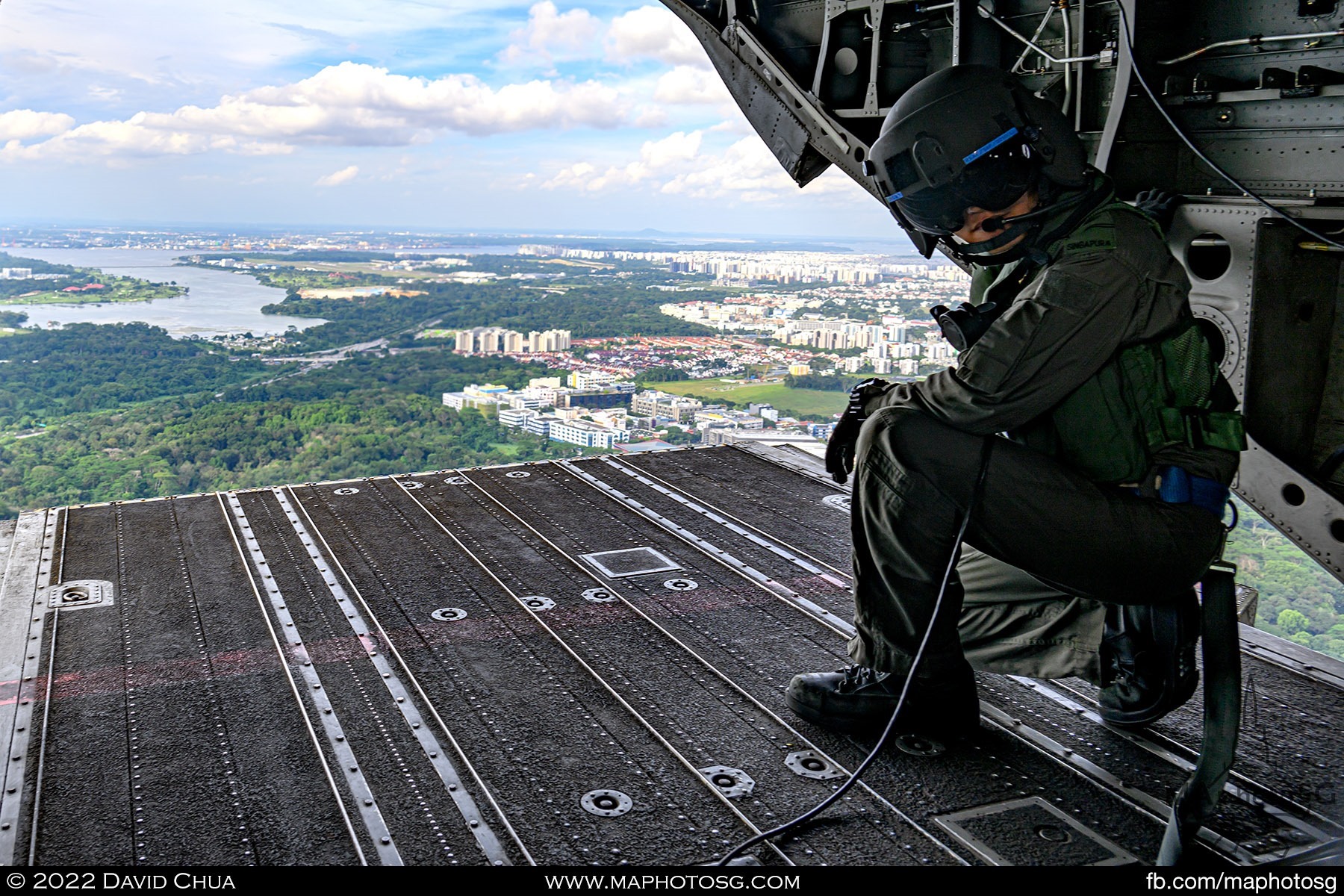 Rear ramp of the Chinook was deployed as the aircrew specialist looks back