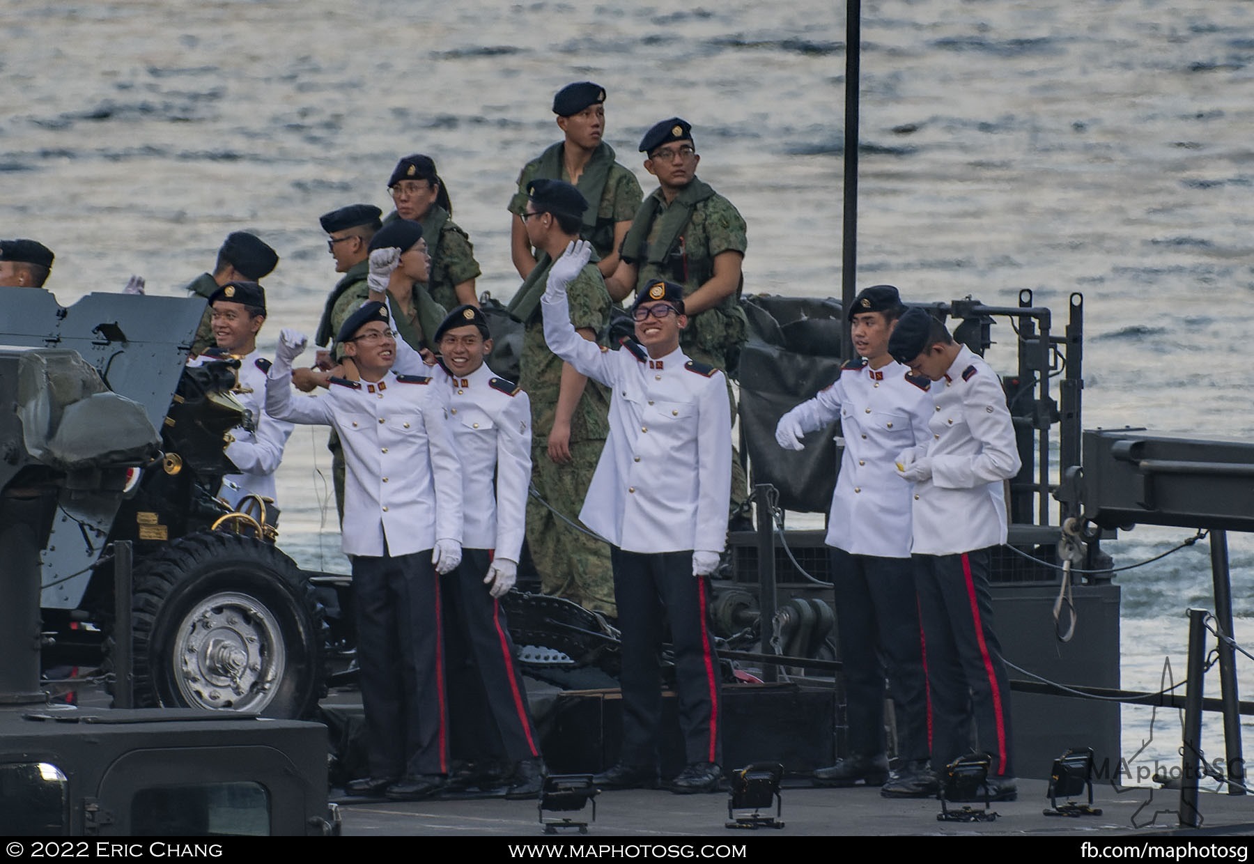 Gunners wave to the crowd around the bay area after they complete their mission