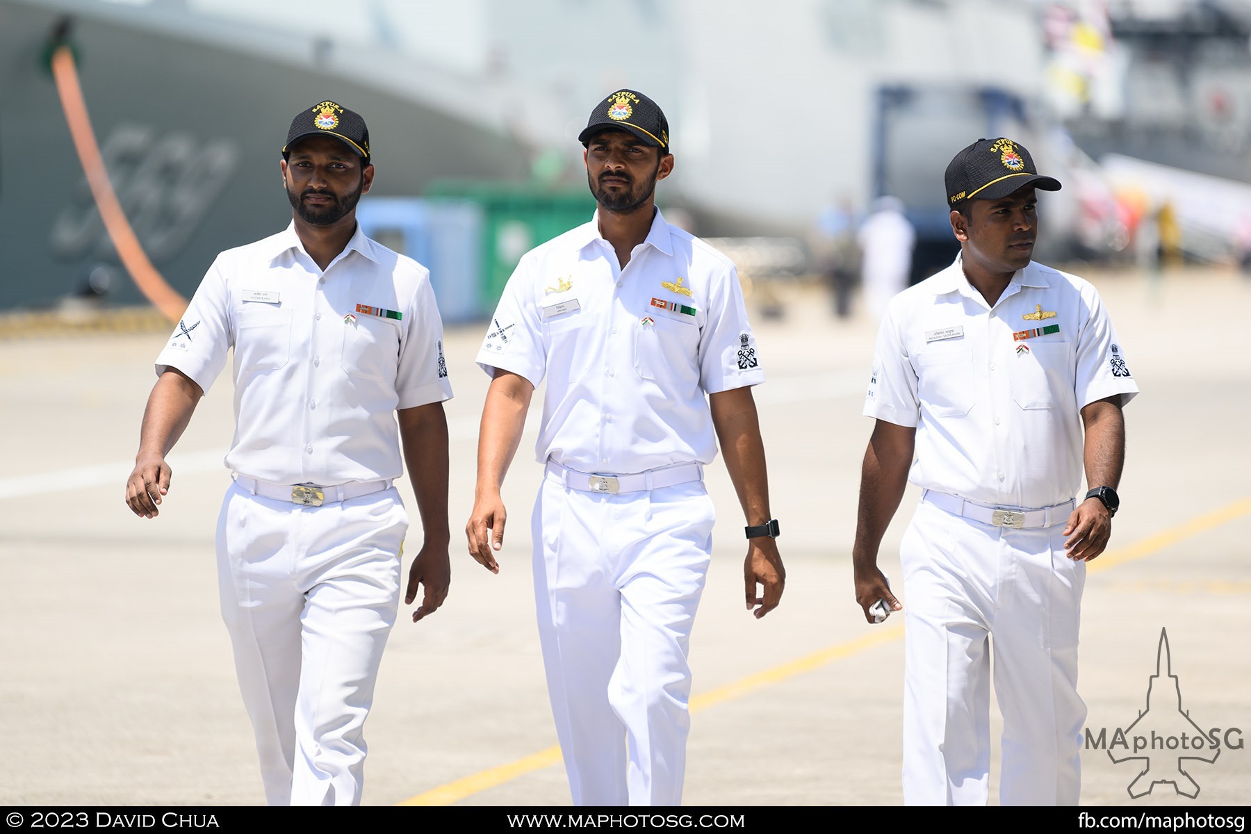 Indian sailers taking a walk along the berths.