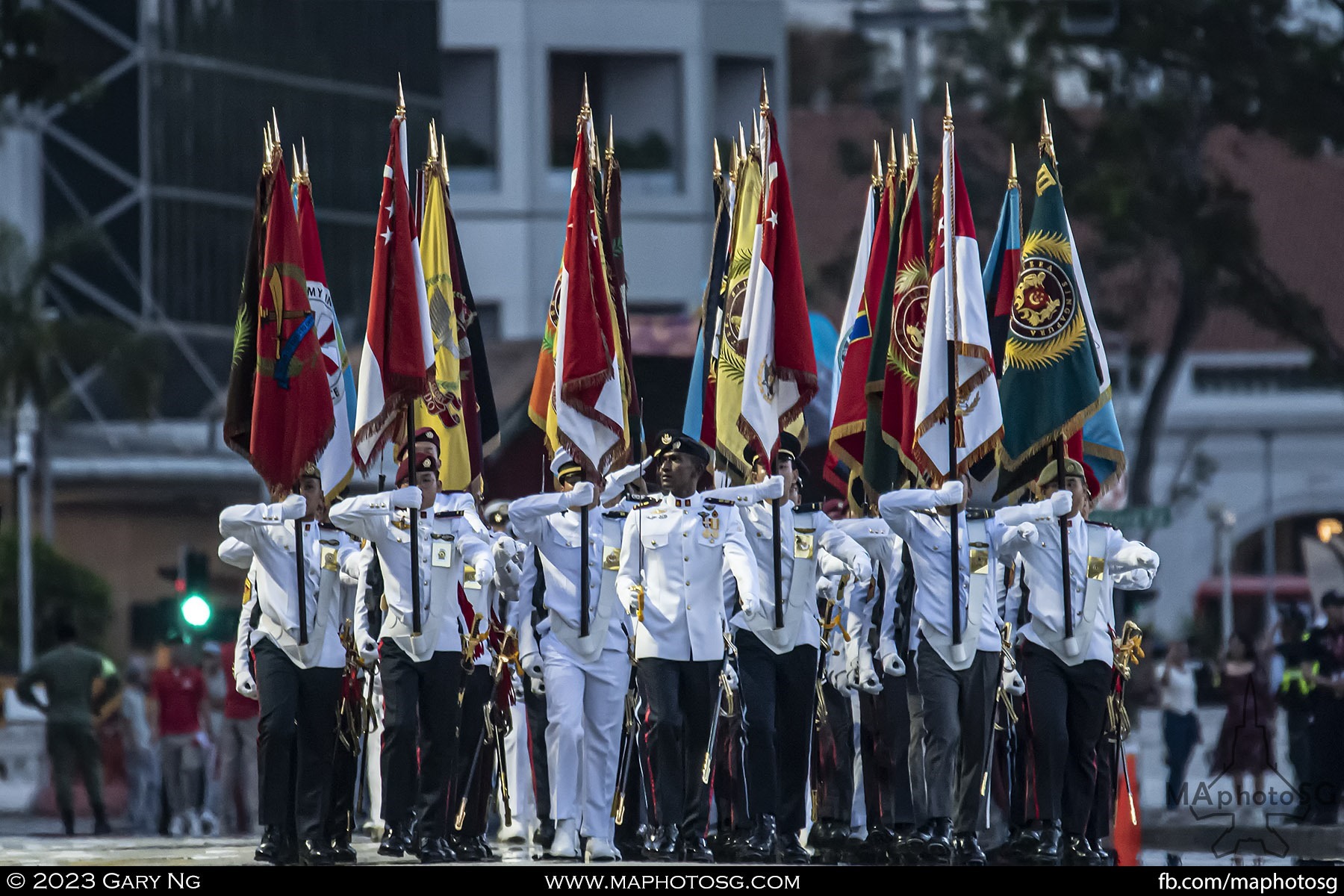 NDP 2023 Parade Commander, Lieutenant Colonel (LTC) Ragumaran S/O Davindran, leads the Colour Party as the contingents march out