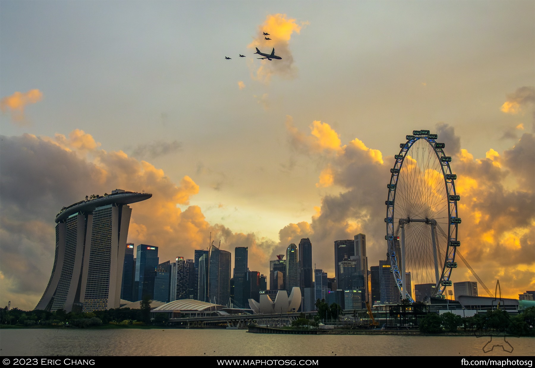 The MRTT and F-16 formation flies against a stunning Marina Bay backdrop.