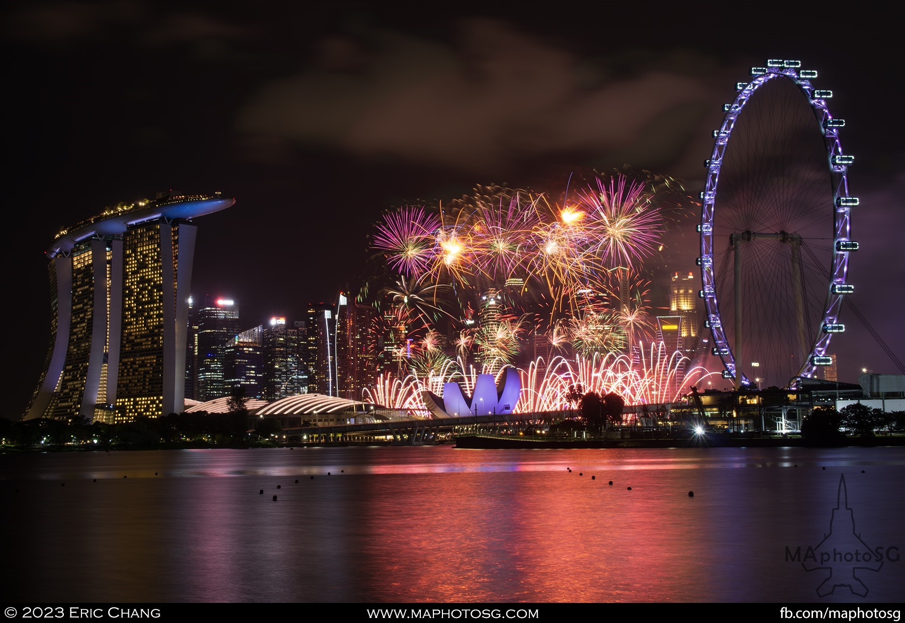 Beautiful fireworks light up the Marina Bay area.