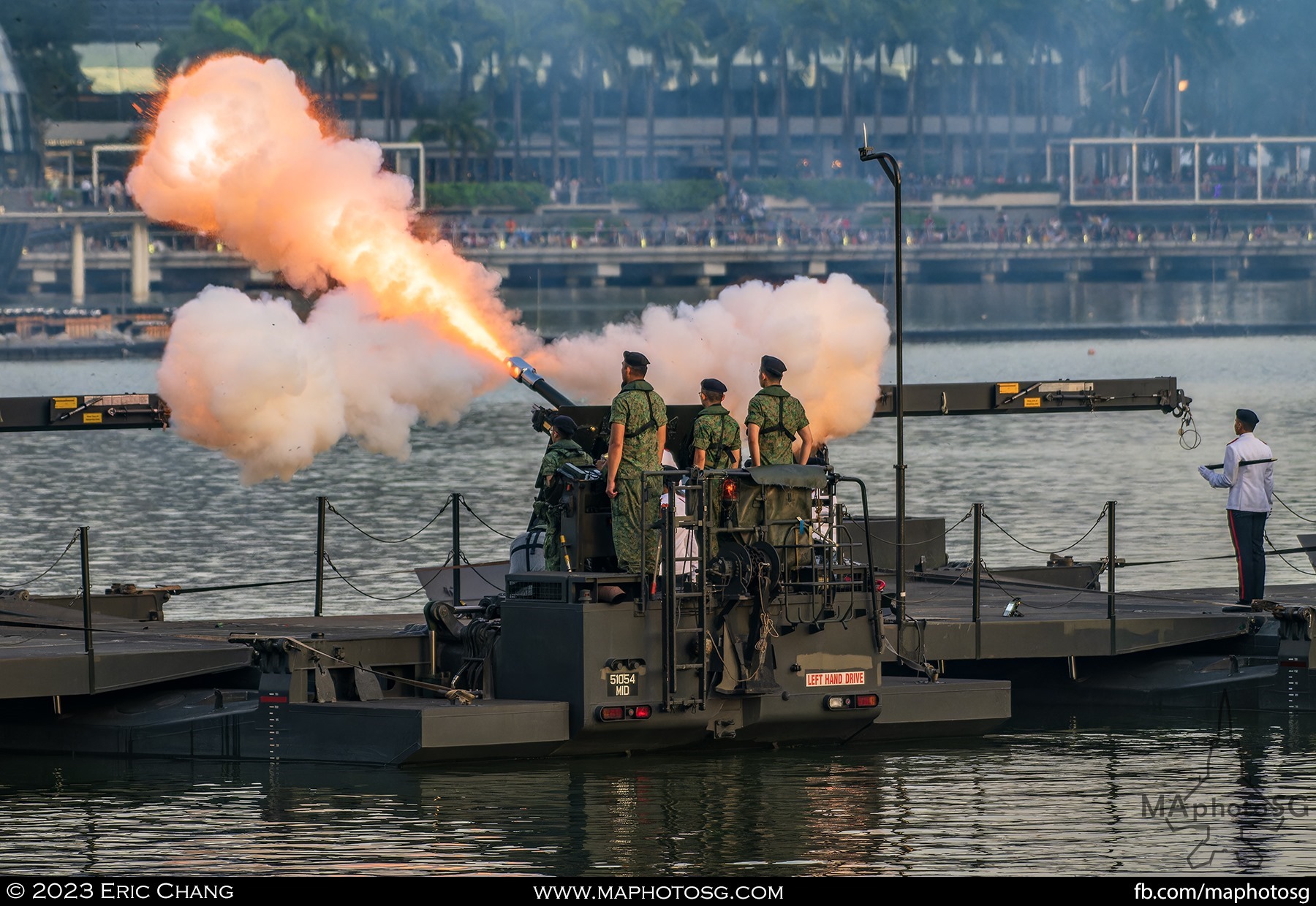 The 21 gun salute happens concurrently with the President's inspection of the parade.