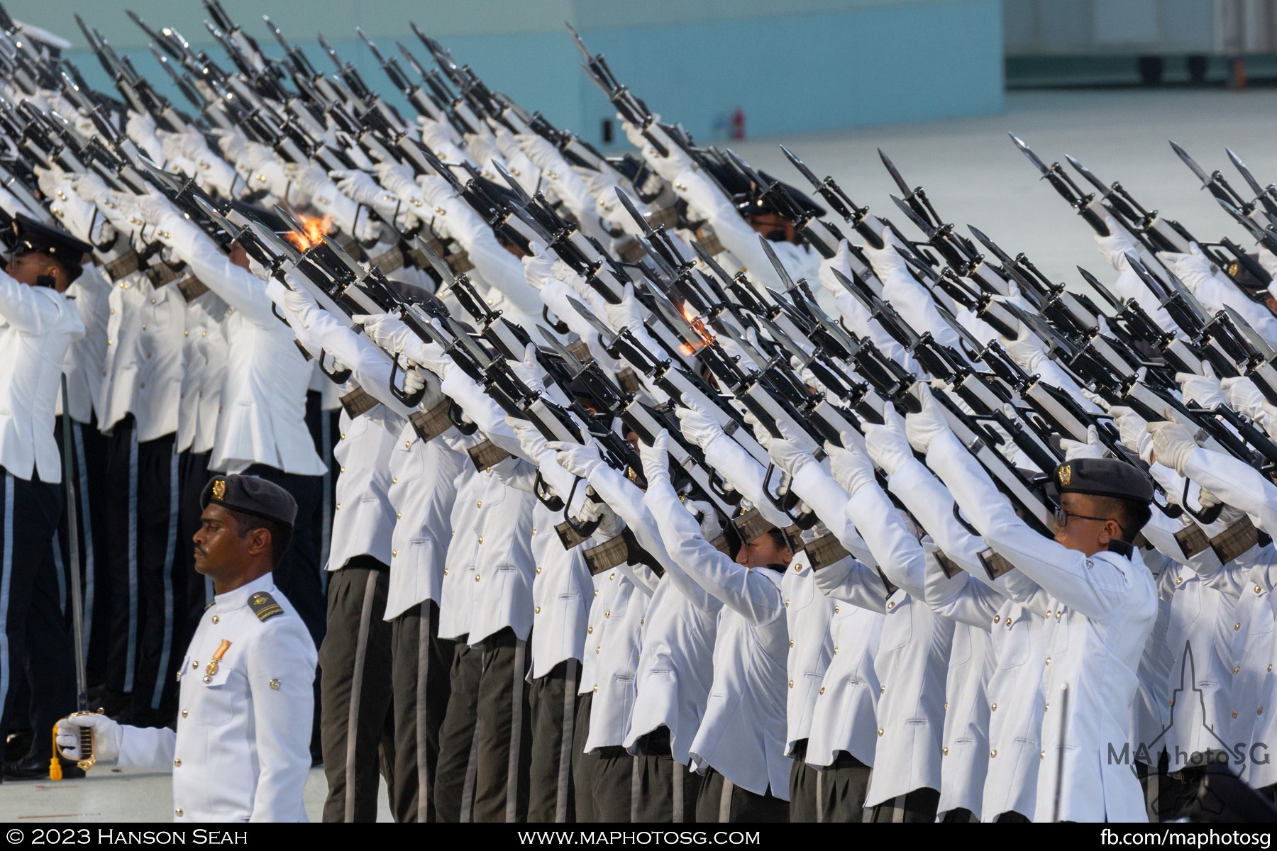The DIS Guard-of-Honor firing the SAR-21 for the feu de joie.